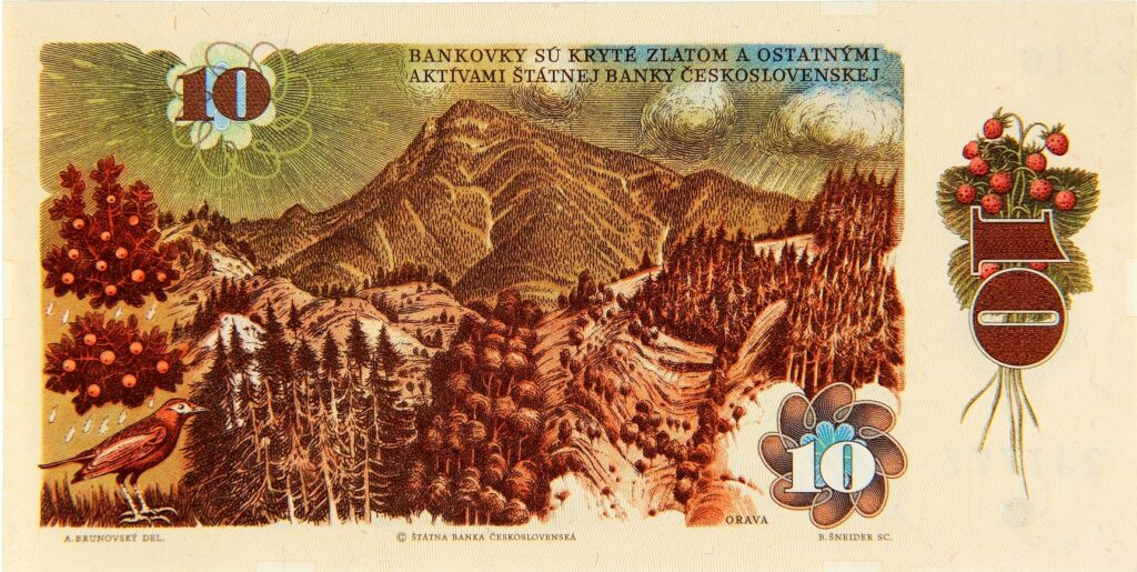 Historická československá desaťkorunová bankovka s hornatou krajinou, stromami a vtákom v popredí zdôrazňuje umelecké spracovanie inšpirované história kremnickej mincovne, ktorej okraj zdobia bobule a listy. Nominálna hodnota 10 sa objavuje dvakrát.